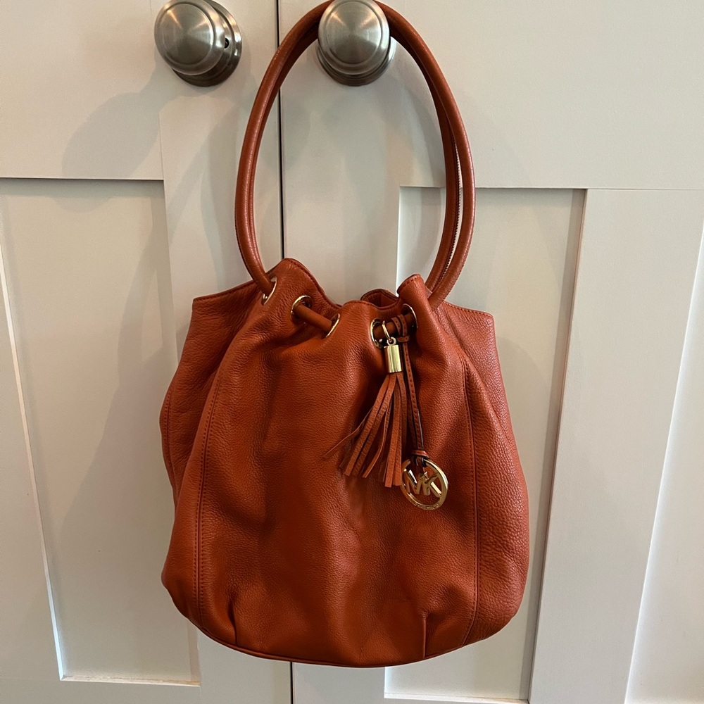 MK by Michael Kors, pumpkin colored leather bag